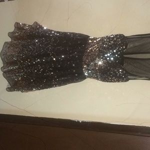 Black and gold sequin dress